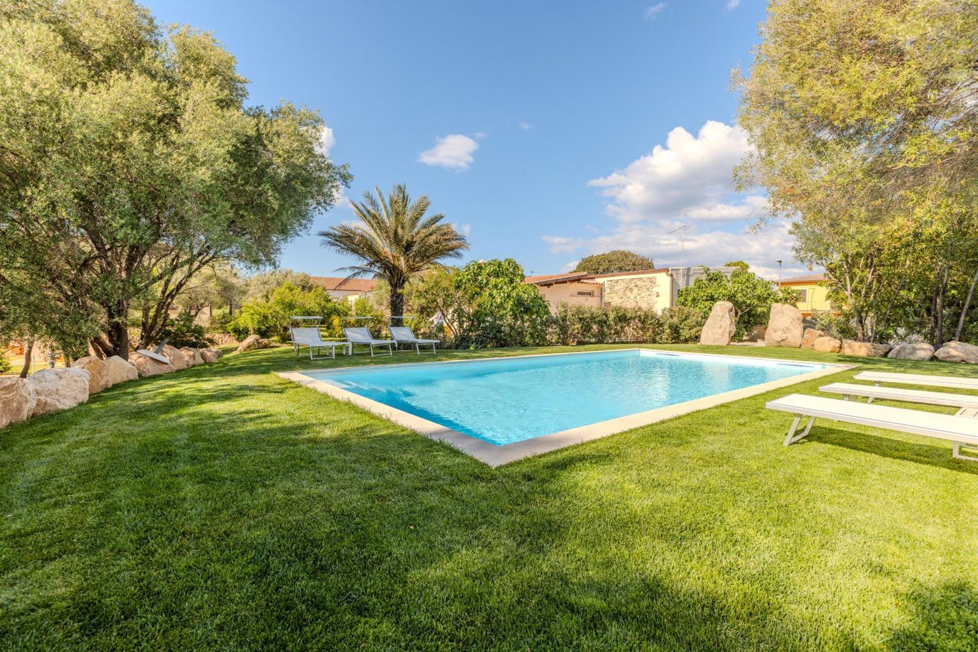 Апартаменты Stazzo San Teodoro Il Ginepro Piscina Condivisa Экстерьер фото