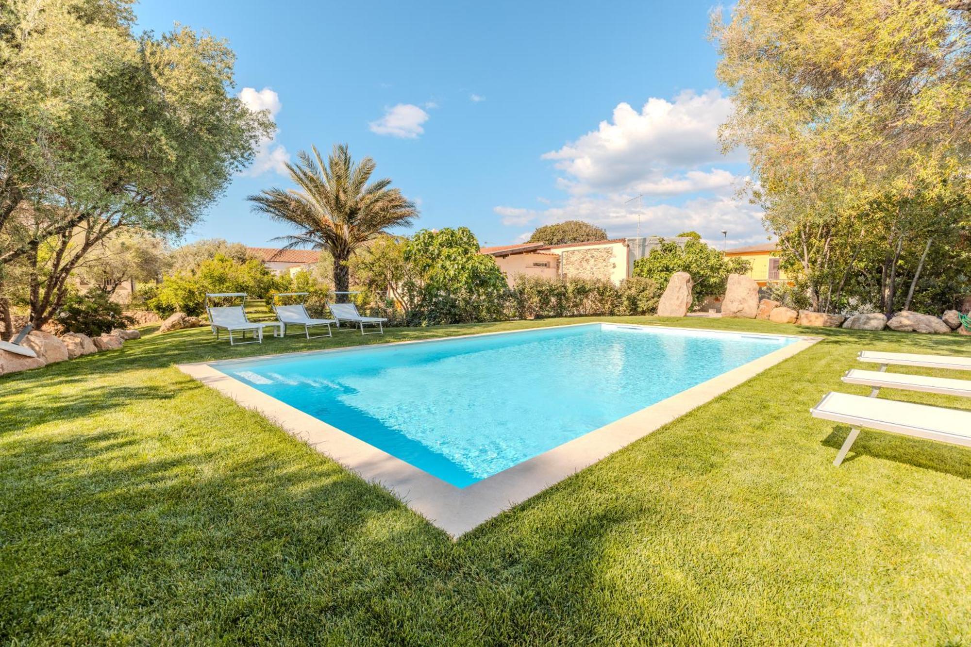 Апартаменты Stazzo San Teodoro Il Ginepro Piscina Condivisa Экстерьер фото